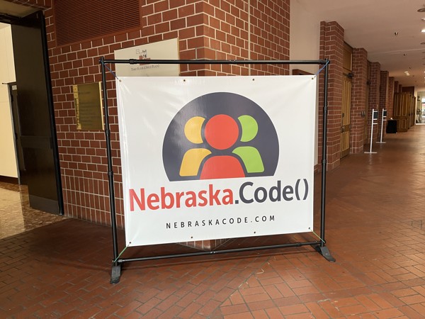 A picture of the Nebraska.Code welcome sign in the Lincoln Cornhuskser Marriott hotel.