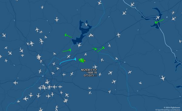 A screenshot of the Flightaware Live Map showing dozens of planes being tracked around north Georgia.