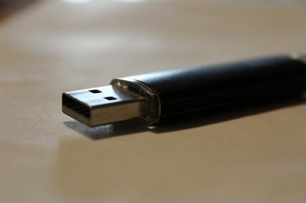 An image of a USB memory stick on a table.